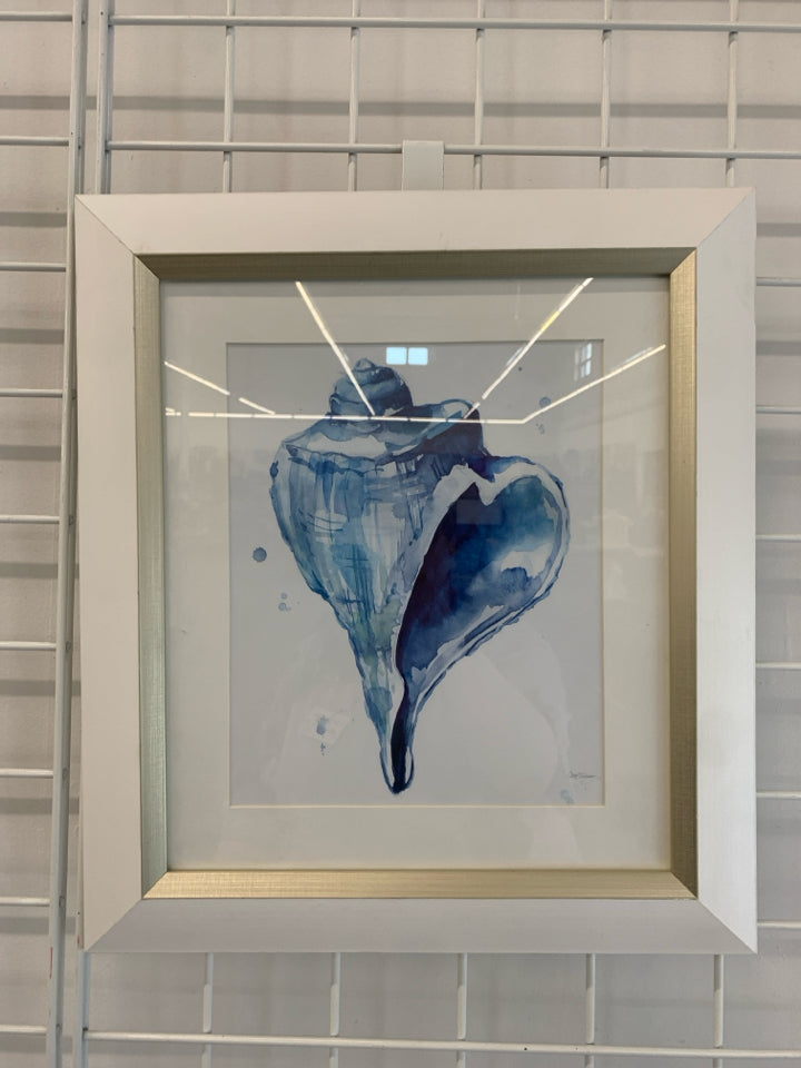 CONCH SHELL WATERCOLOR IN WHITE WOOD FRAME.