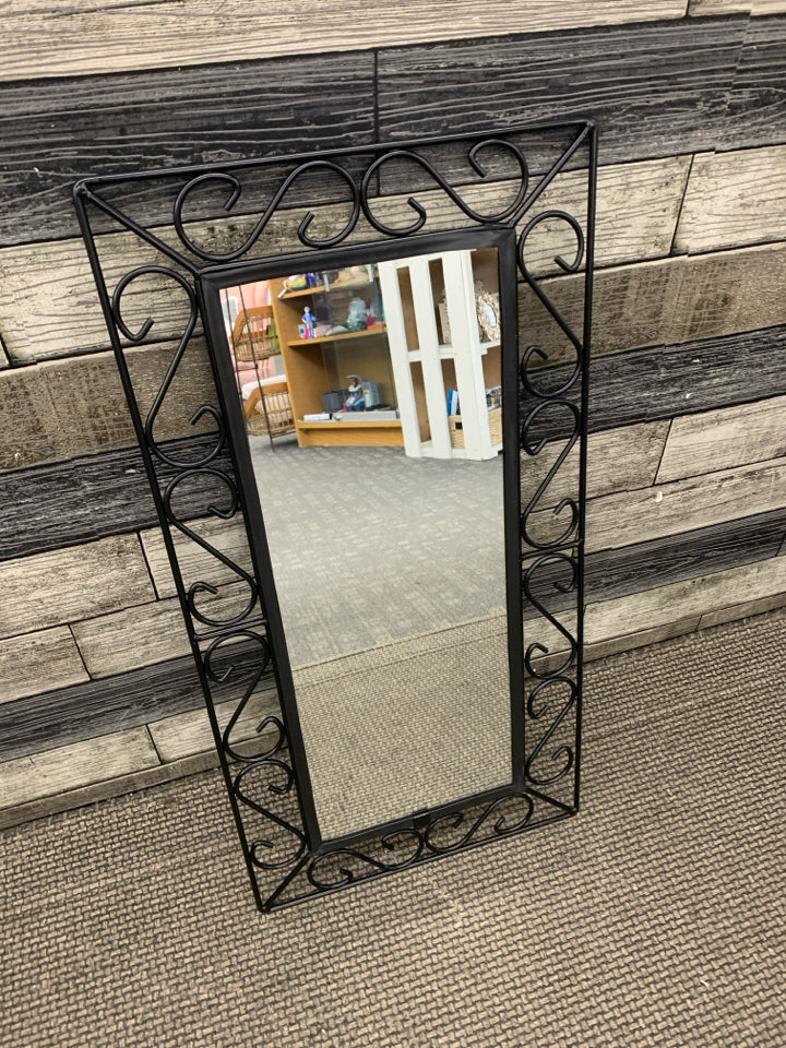 MIRROR W/ BLACK METAL FRAME WALL HANGING.