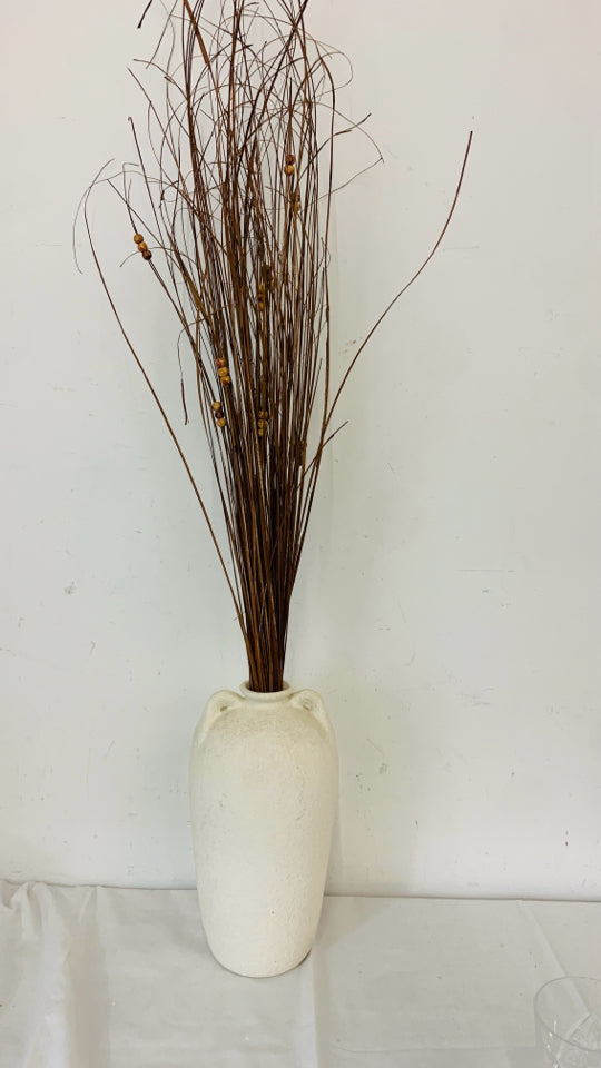 TEXTURED STONE LIKE JUG VASE WITH FAUX STICKS.