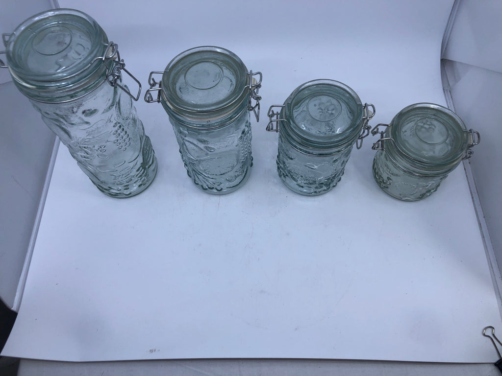 4PC GLASS CANISTER SET W/LOCKING LIDS- FRUIT EMBOSSED.