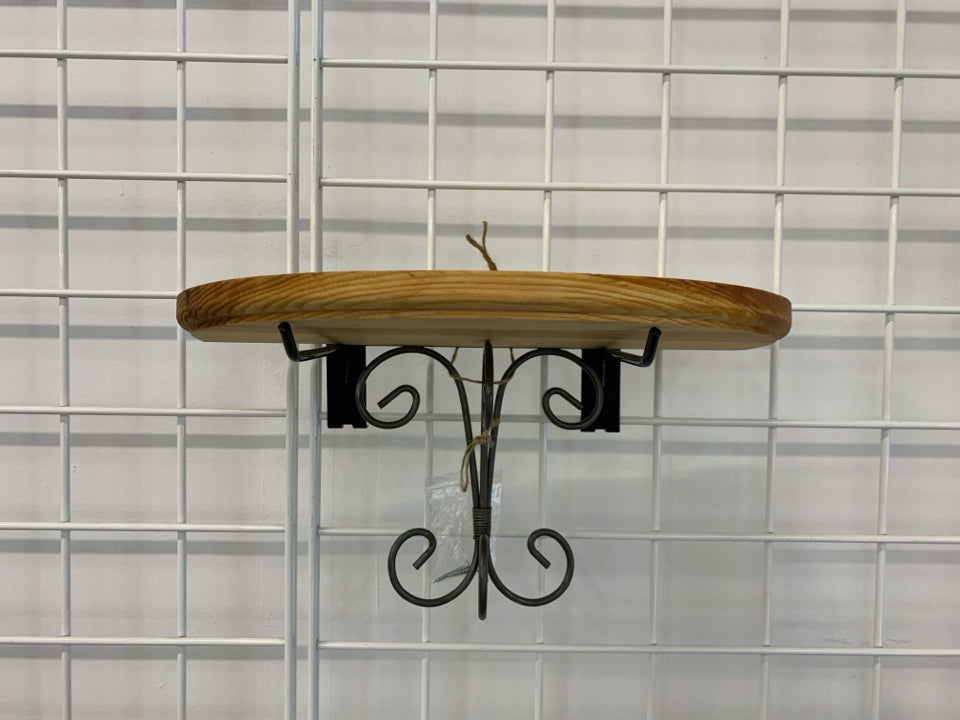WOOD HALF CIRCLE WALL SHELF W/METAL SCROLL.