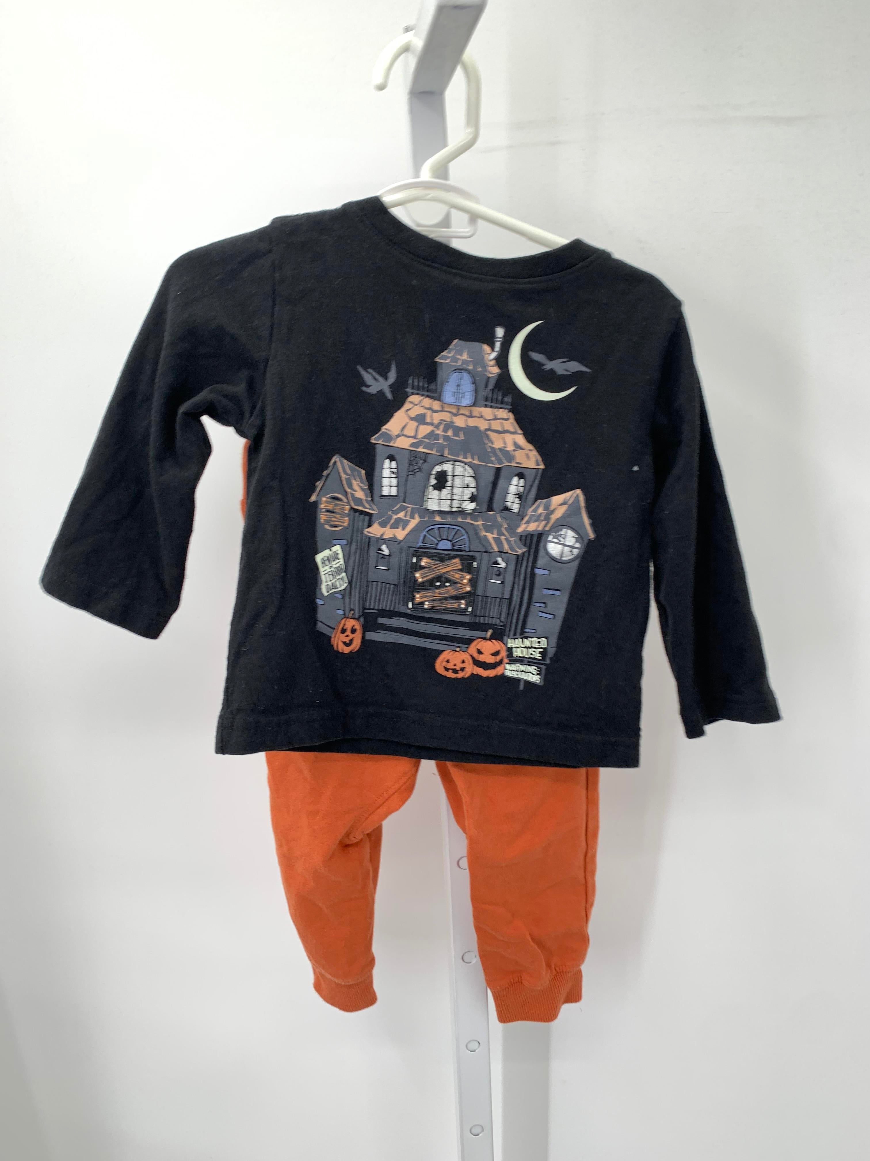 HAUNTED HOUSE SHIRT AND ORANGE PANTS.