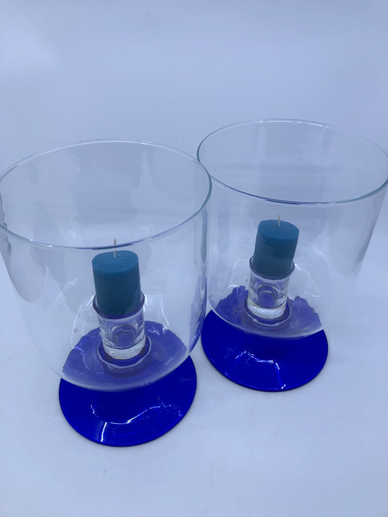2 BLUE FOOTED CANDLE HOLDER.
