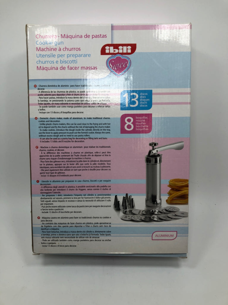 NIB COOKIE MAKER W/ATTACHMENTS.