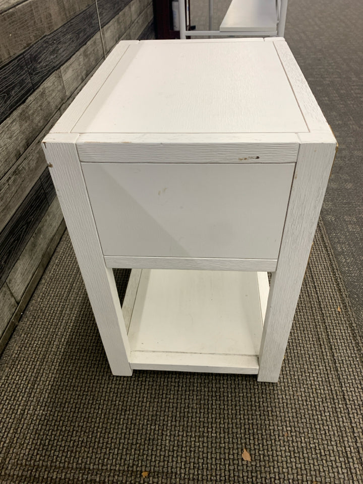 WHITE LOW TWO TIER SIDE TABLE W/ GOLD HARDWARE CIRCLE HANDLES.