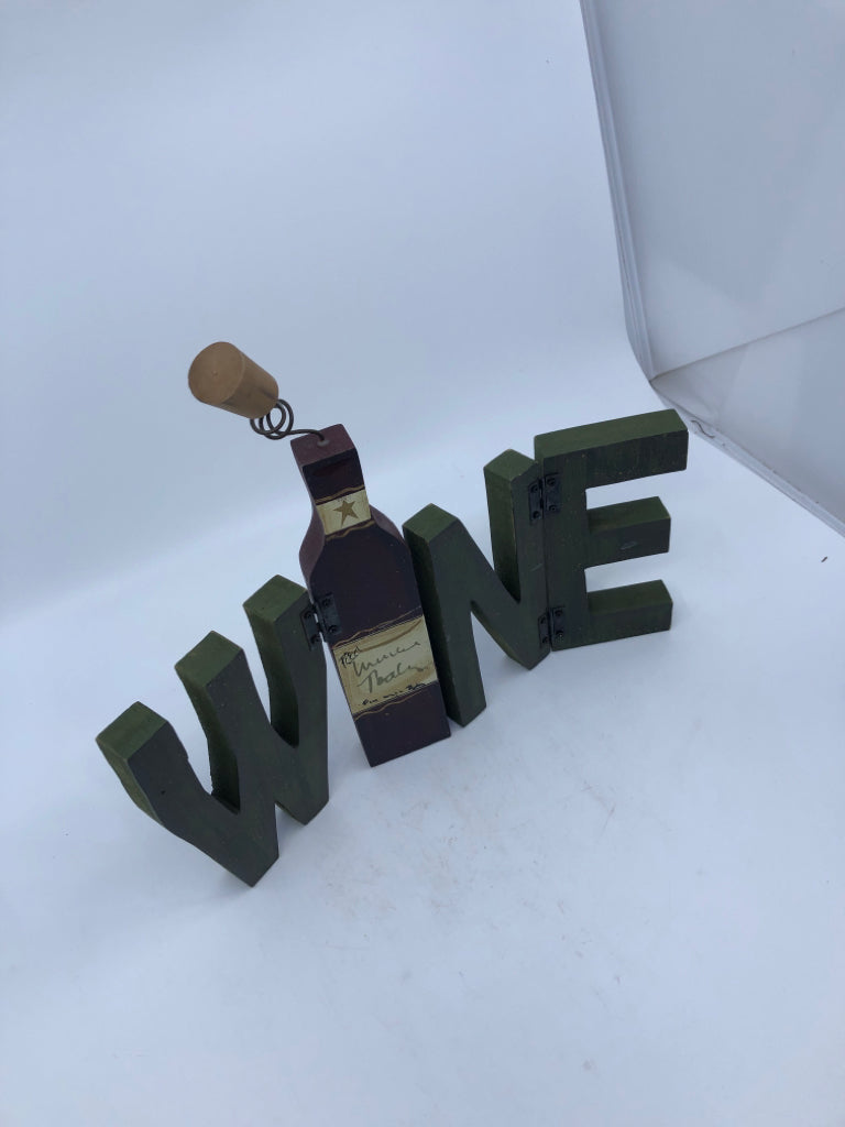 WINE GREEN/MAROON CUTOUT FOLDABLE SIGN.