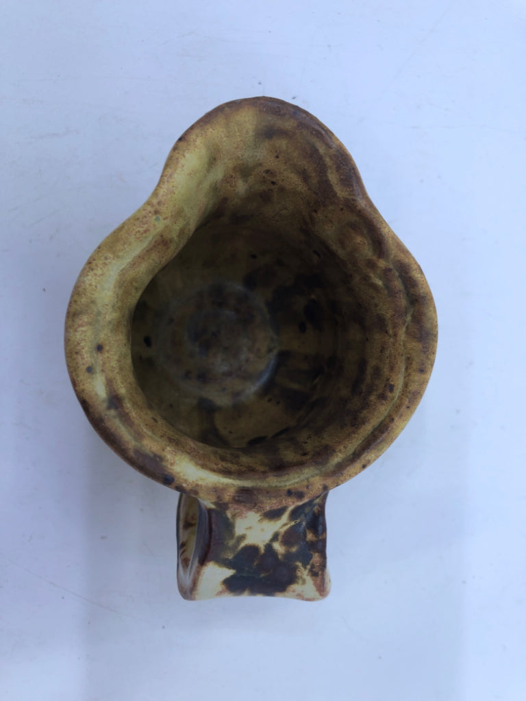 BROWN AND YELLOW COW PATTERN CREAMER.