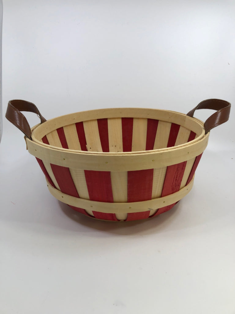 ROUND BASKET W/RED AND FAUX LEATHER HANDLES.