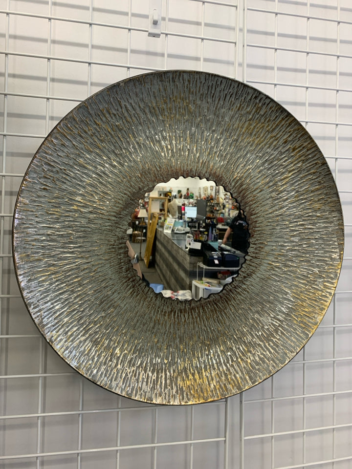 LARGE ROUND METAL MIRROR.
