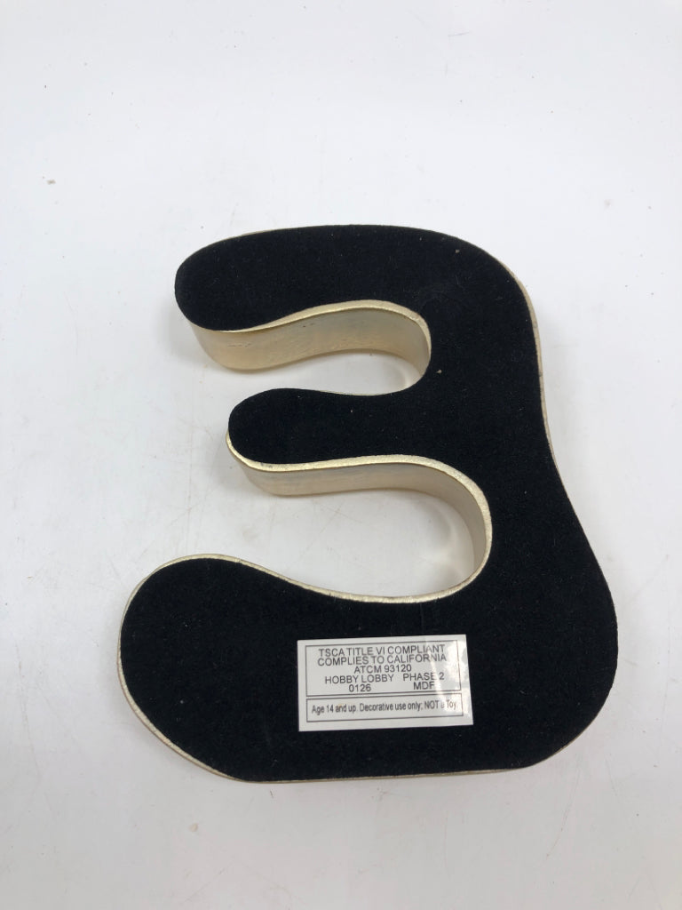 GOLDEN "E".