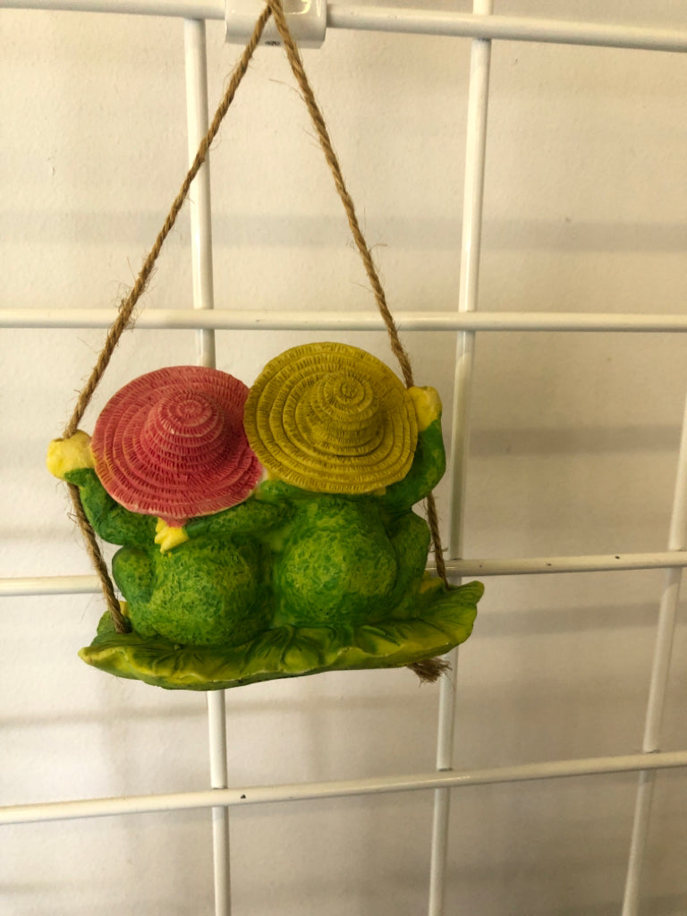 HANGING HUSBAND AND WIFE FROGS ON LILY PAD.