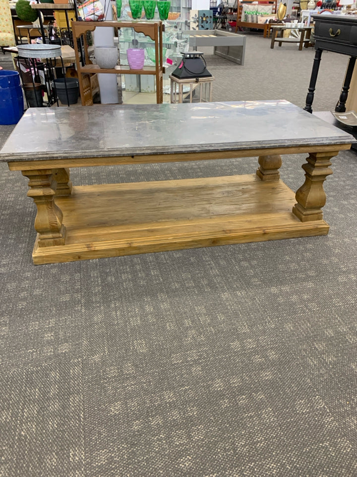 BLUESTONE TOP COFFEE TABLE W/WOOD BASE.