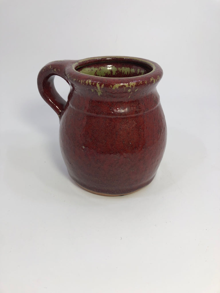 PRIMITIVE RED&GREEN GLAZED TEA LIGHT HOLDER W/STAR CUT OUT.