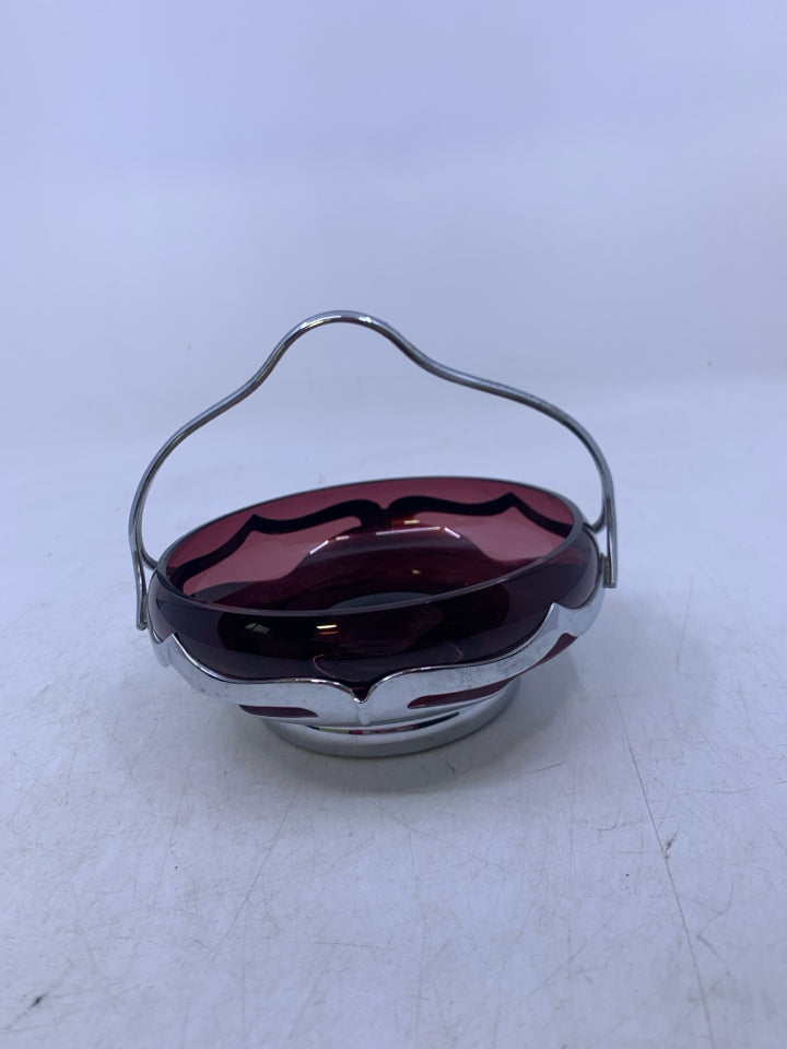 SILVER METAL BASE W/ SHALLOW PURPLE GLASS INSERT.