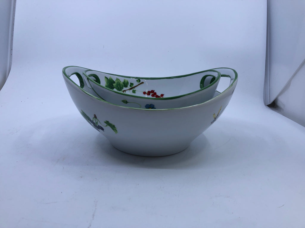 2 NESTING BOWLS W/FRUITS INSECTS WHITE GREEN RIM W/ HANDS.