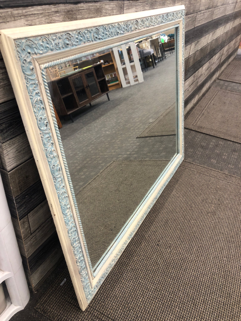LARGE LIGHT BLUE EMBOSSED HANGING MIRROR.