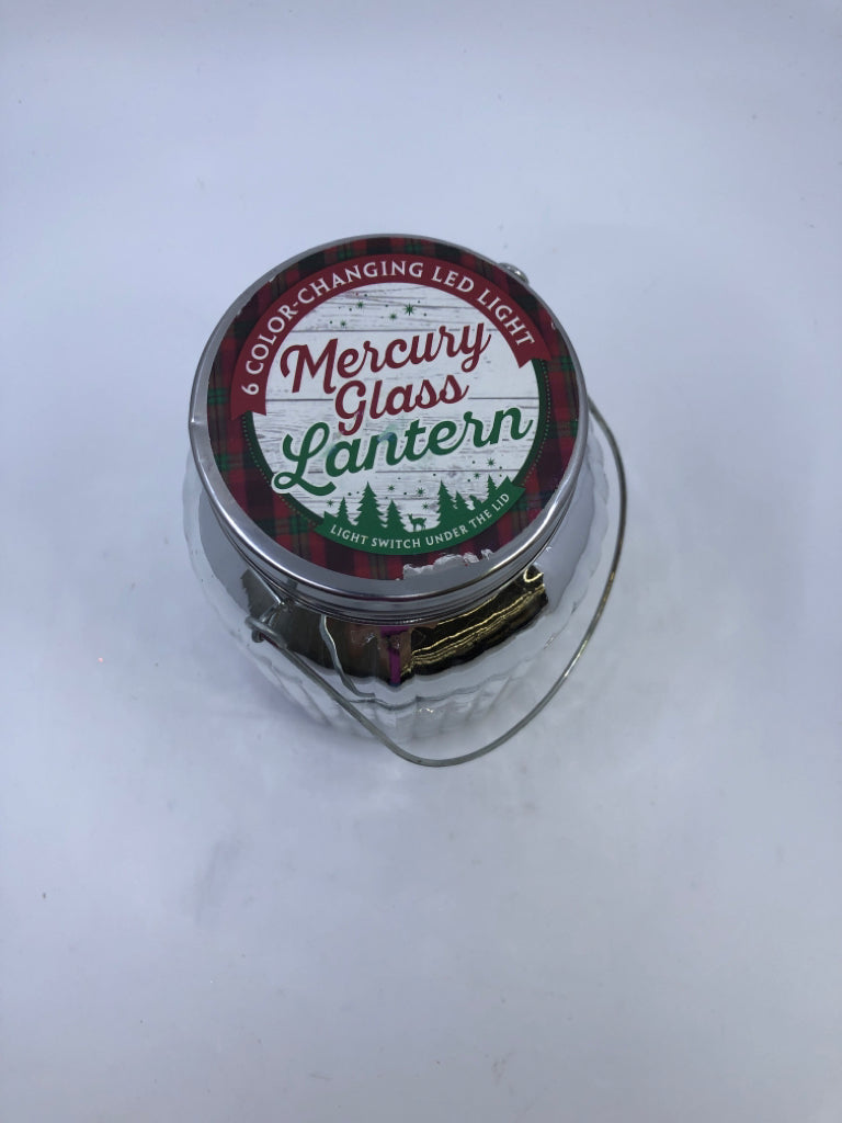 COLOR CHANGING MERCURY GLASS SNOWMAN LANTERN.