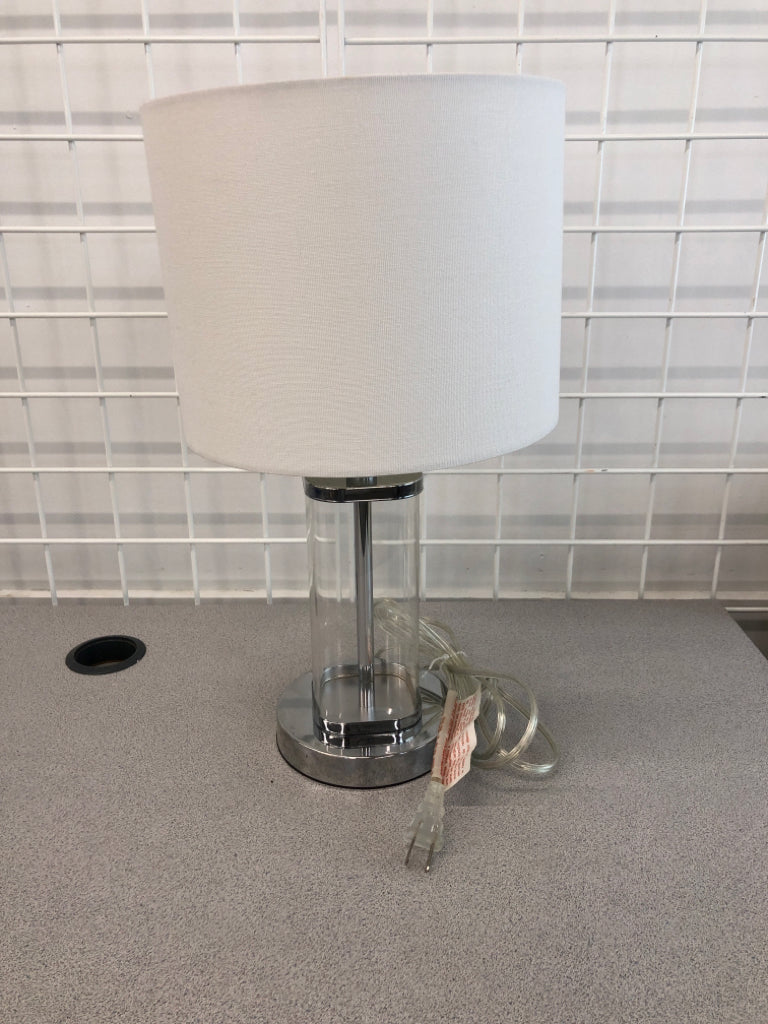 CLEAR BASE METAL LAMP W/CANVAS SHADE.