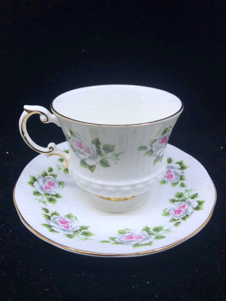 VTG WHITE AND PINK ROSE TEA CUP AND SAUCER.