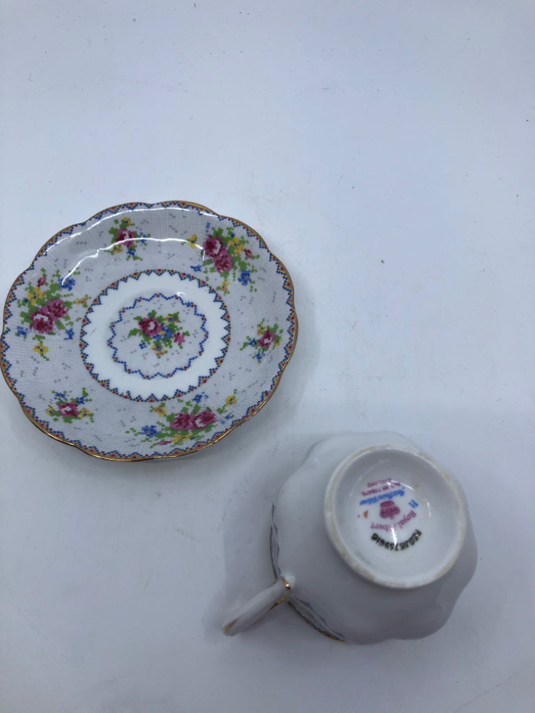 VTG PETIT POINT PATTERN W PINK ROSES TEACUP AND SAUCER.