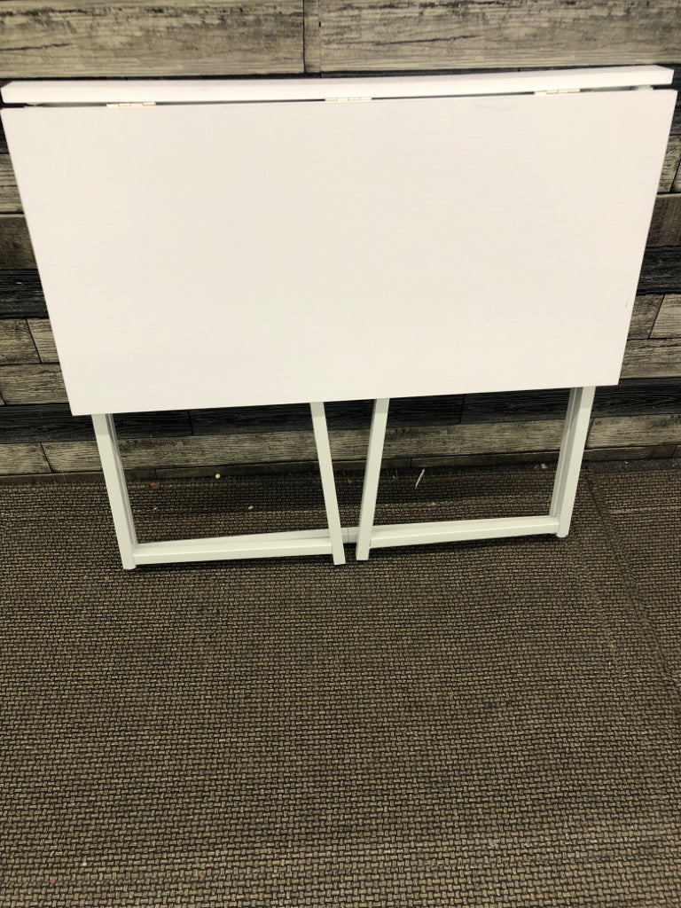 WHITE FAUX WOOD FOLD UP DESK.