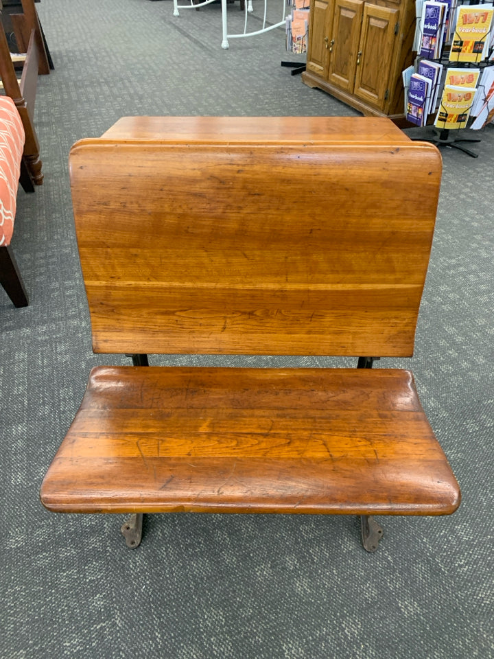 VTG DK WOOD SCHOOL DESK W/IRON SCROLL BASE.