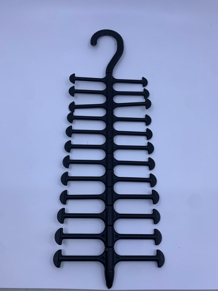 BLACK PLASTIC TIE HANGER.