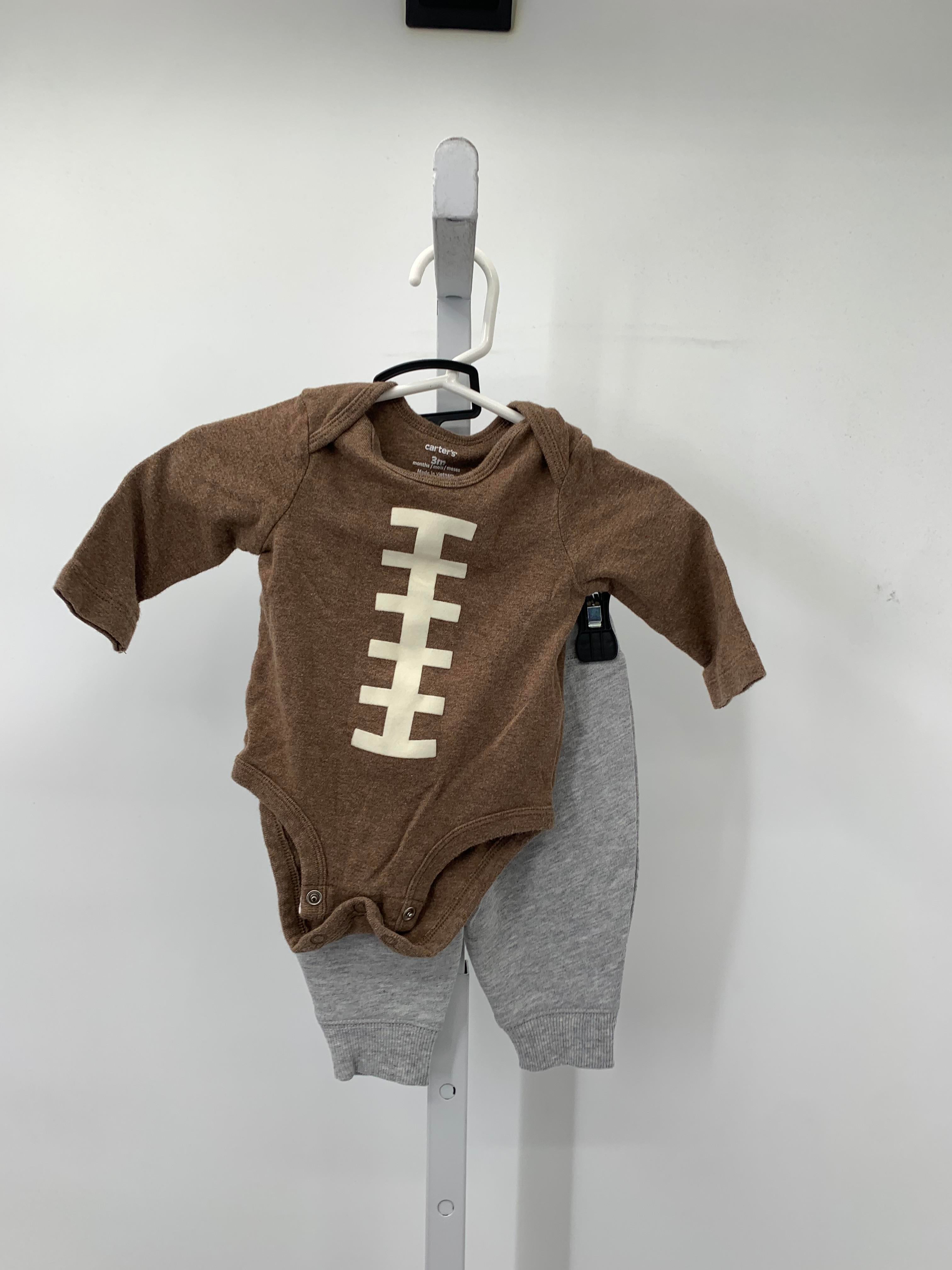 FOOTBALL SHIRT AND GREY PANTS