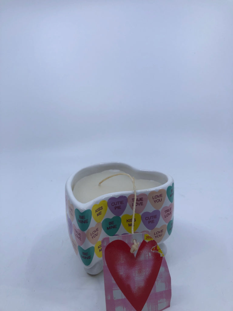 SWEETHEARTS PATTERNED HEART SHAPED FOOTED CANDLE.