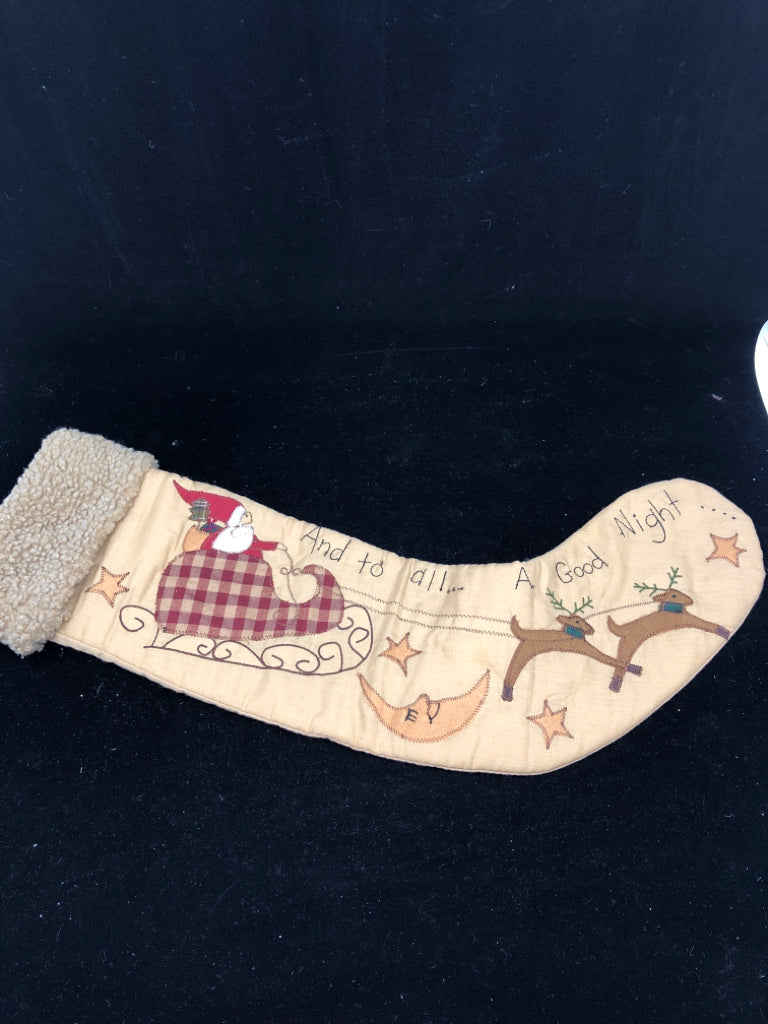 TAN PRIMITIVE SEWN STOCKING.