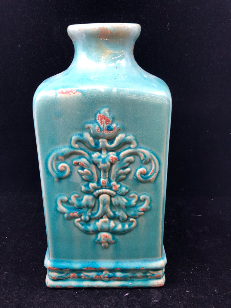 TEAL CERAMIC VASE W/ EMBOSSED MEDAILION RUSTIC LOOK.
