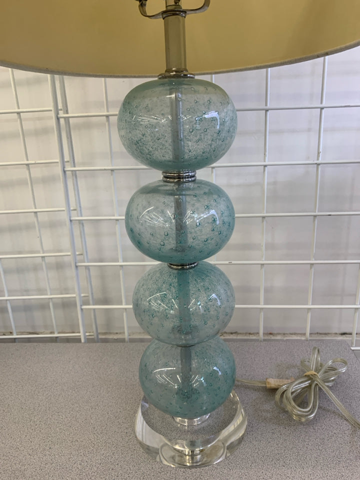 BLUE STACKING GLASS BALL BASE W/ CREAM SHADE.