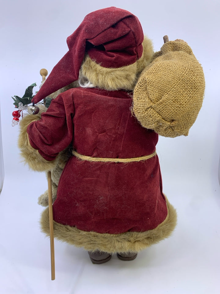 SANTA IN RED AND BROWN COAT W TEDDY BEAR.
