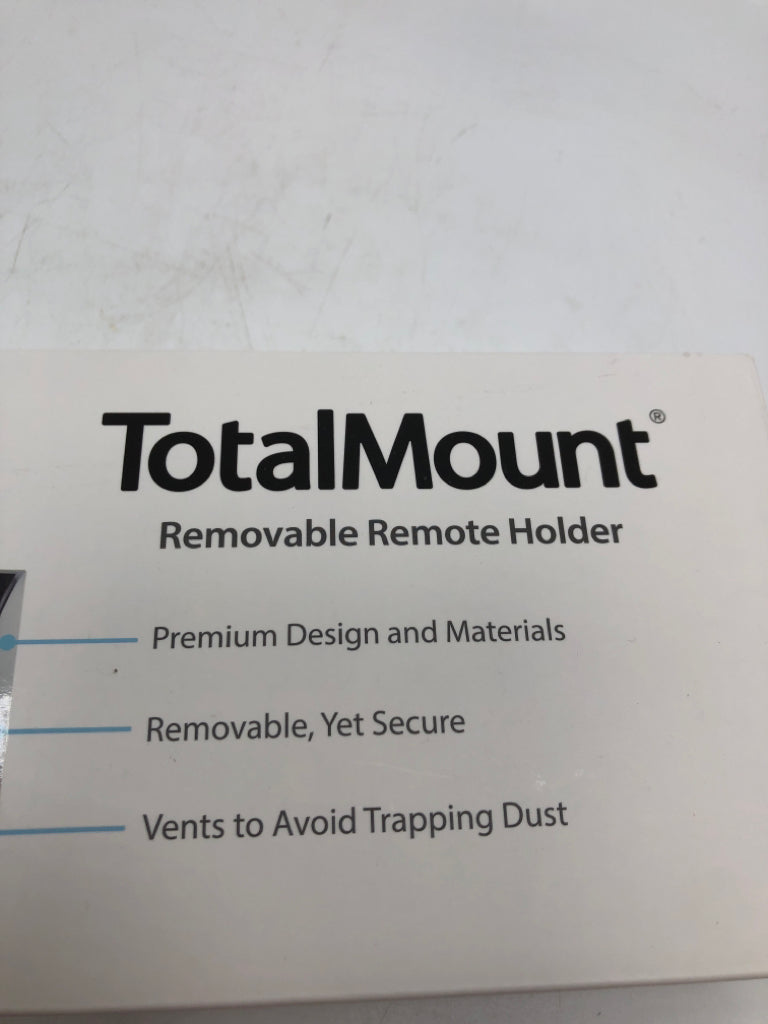 NIB TOTAL MOUNT REMOVABLE REMOTE HOLDER.