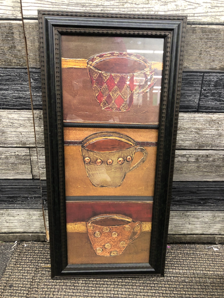 3 COFFEE MUGS IN BROWN FRAME.