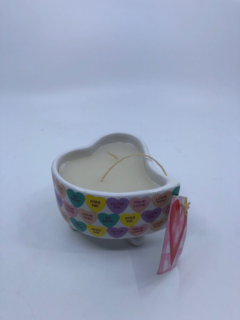 SWEETHEARTS PATTERNED HEART SHAPED FOOTED CANDLE.