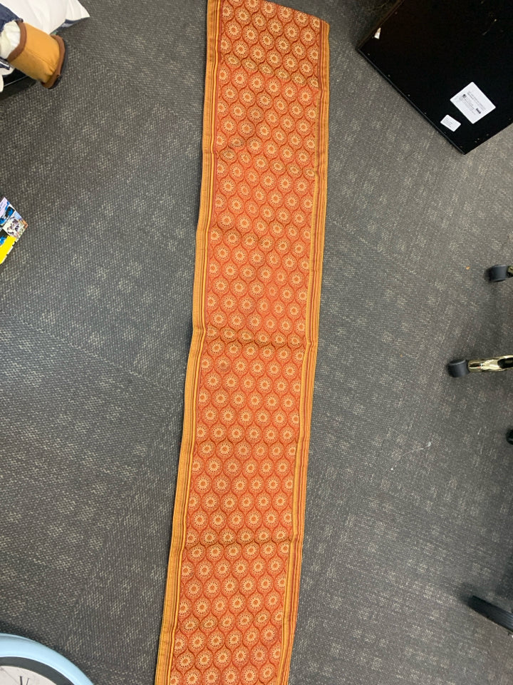 ORANGE & RED MEDALLION TABLE RUNNER.