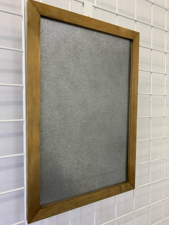 MAGNETIC BOARD IN WOOD FRAME WALL HANGING.