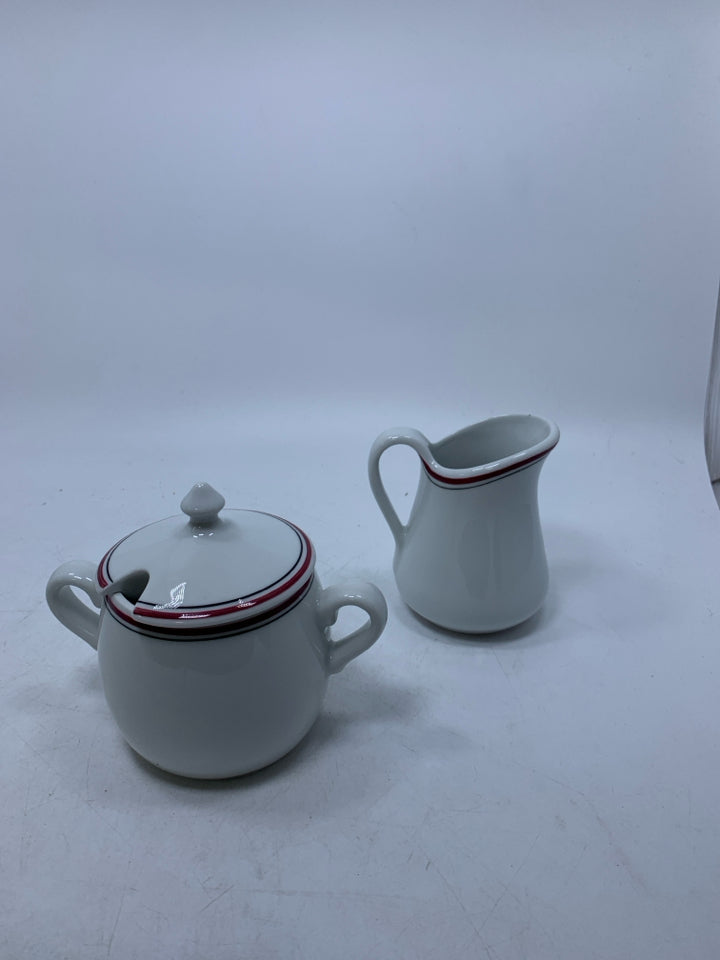 2 PC SUGAR/CREAMER W/ BLACK & RED STRIPE.