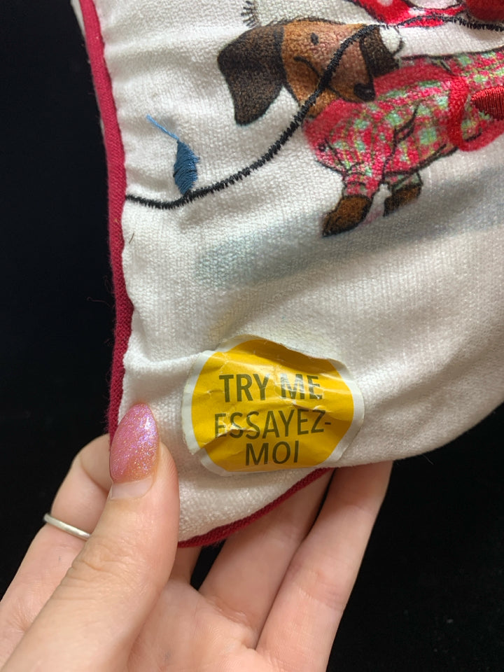 NOISE MAKING CHRISTMAS PILLOW.