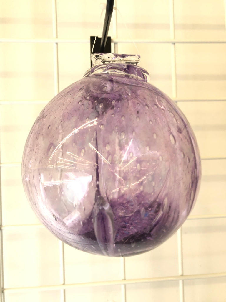 GLASS PURPLE SUN CATCHER.