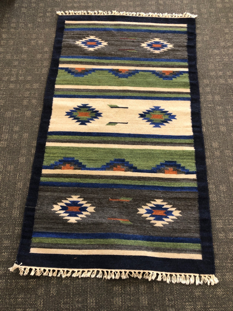 BLUE PATTERN KILIM RUG W/WHITE FRINGE.
