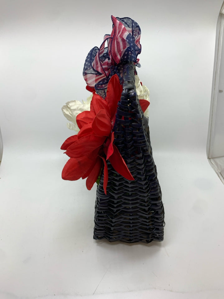 RED WHITE AND BLUE BOUQUET IN BLUE BASKET.
