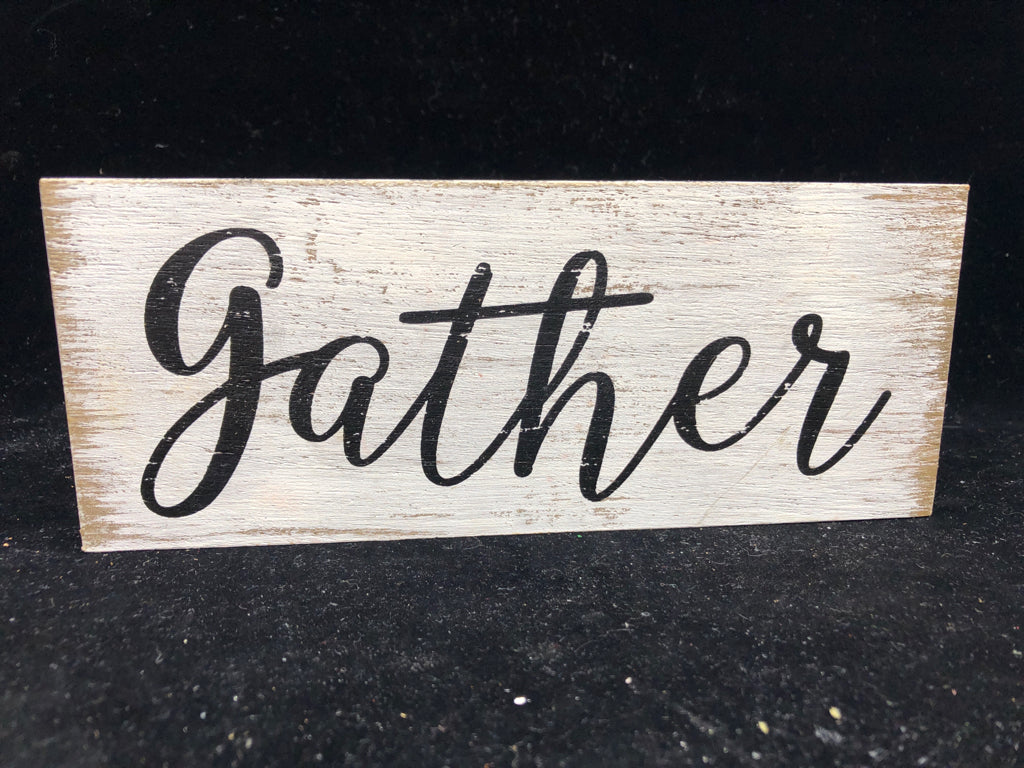 GATHER STANDING SIGN.