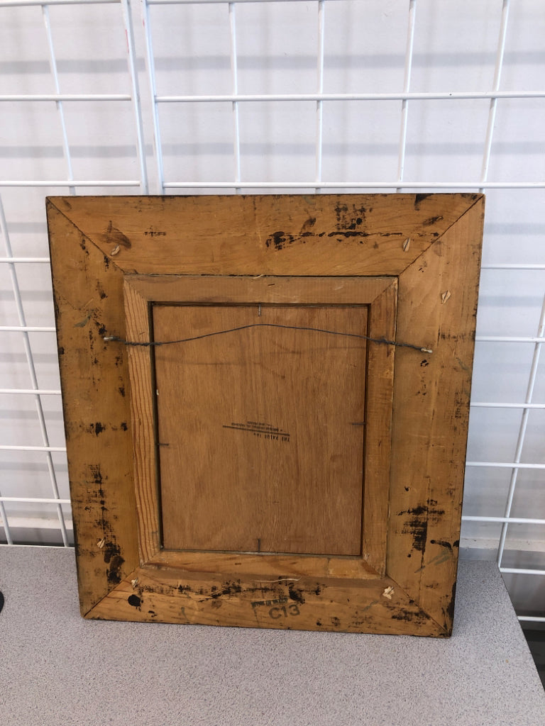PAINTED MAN ON BOAT W/CHURCH? IN CARVED WOOD FRAME.