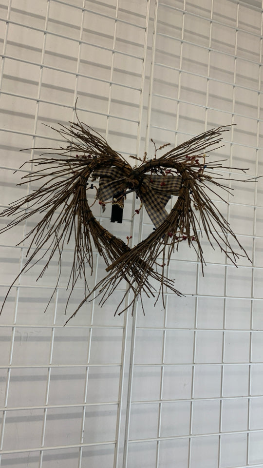 HEART SHAPED TWIG WREATH W/RED/WHITE/BLUE PIP+PLAID BOW.