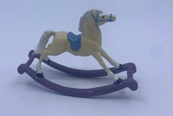 CERAMIC ROCKING HORSE.