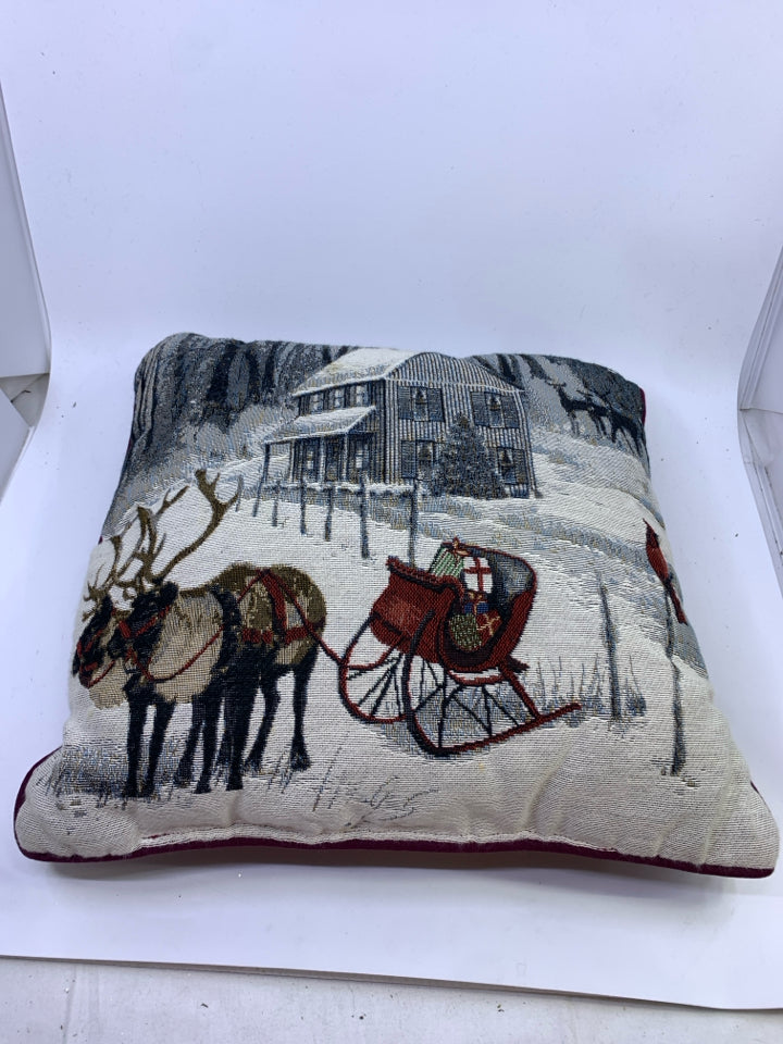 REINDEER AND SLED PILLOW.