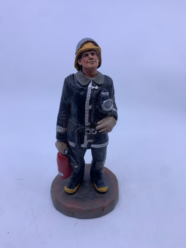 FIRE MAN STANDING FIGURE- MICHAEL GARMAN.