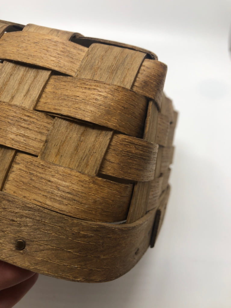 LIGHT BROWN WOVEN BASKET.